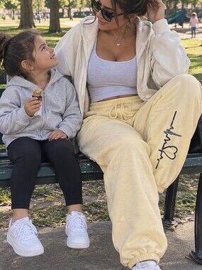 Tan Sweatpants with Love Print On Leg.